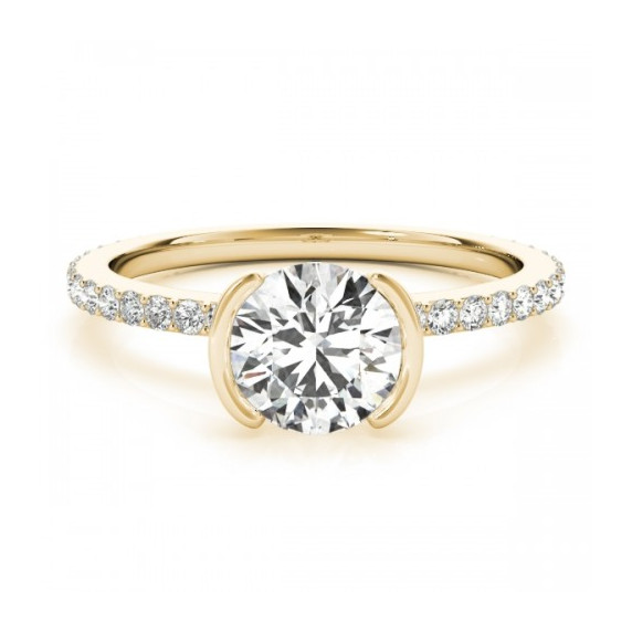 Lumiere Ring with a dazzling center diamond in a minimal, modern setting—ideal for the vibrant energy of Sagittarius.