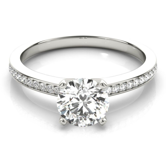 Petite Windsor Solitaire Engagement Ring with a round center diamond on a thin, polished white gold band.