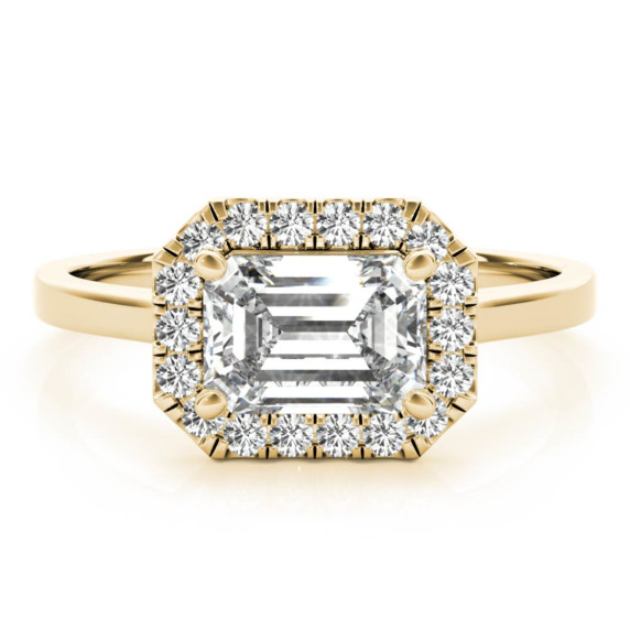Wilshire Halo Ring with an oval center diamond encircled by a sparkling diamond halo and tapered shoulders.