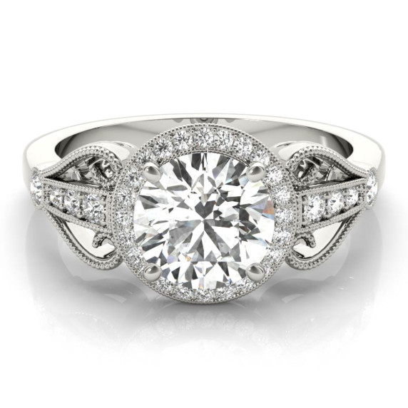 Regal Halo Ring boasting a large center stone and double halo with intricate vintage detailing.