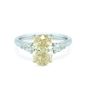 2 1/2 ct. tw. Oval Fancy Yellow Three Stone Engagement Ring in 14K White and Yellow Gold