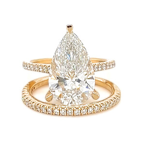 5 3/4 ct. tw. Pear Side Stone Bridal Set 14K Yellow Ring