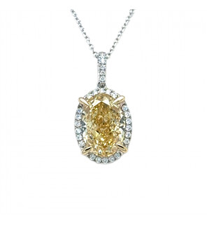 5 1/4 ct. tw. Yellow Oval Halo Pendant in 14k White and Yellow Gold