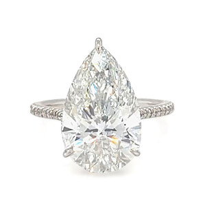 7 4/5 ct. tw. Pear Side Stone Engagement Ring 18K White Gold