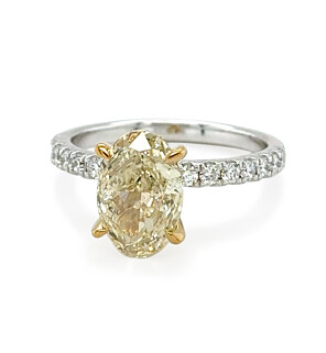 3 ct. tw. Oval Fancy Yellow Side Stone Engagment Ring in 14K White and Yellow Gold