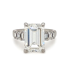 7 4/5 ct. tw. Emerald Side Stone Engagement Ring Platinum